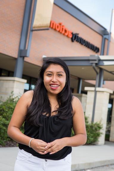 A Beloit College student does an internship in the city of Beloit at the Community Action Center.